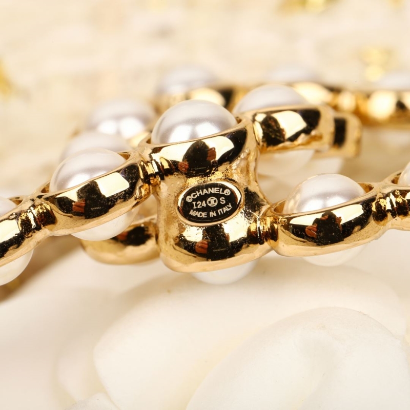 Ch**el brooches
